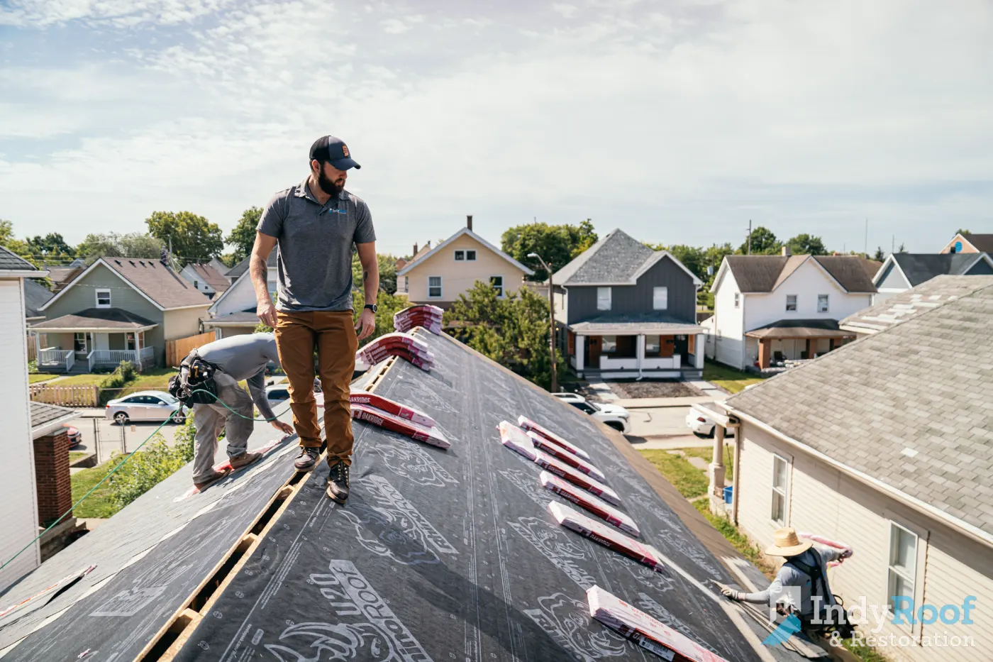 Tarping and dry-in on a Geist Overlook commercial roof